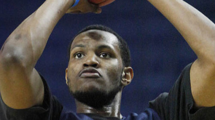 West Virginia's Devin Ebanks shoots during practice.