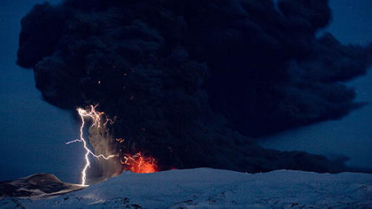 Lightning can be seen amid the lava and ash erupting from the vent of the Eyjafjoll volcano in central Iceland in April.