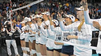Penn State's women's volleyball team cuts down the net after defeating Texas for the NCAA title in Tampa, Fla., in December.