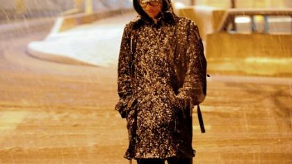Patrick Everettei, student at the Art Institute, trudges across the Smithfield Street Bridge heading home to Mt. Washington as the snow falls.