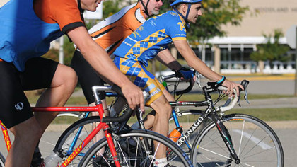 To show appreciation for his Woodland Hills students, Jerry Chessman, right,, principal of Wilkins and Shaffer elementary schools, rode his bike for 18 hours.