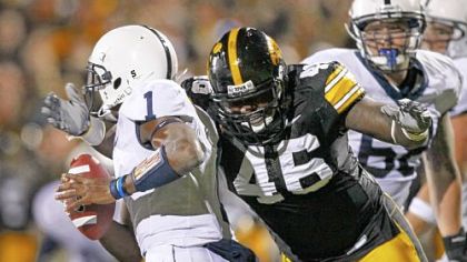 Iowa defensive tackle Christian Ballard sacks Penn State's Rob Bolden, left, Saturday. After the game, Lions coach Joe Paterno opined of his quarterback, "Maybe we're asking too much of the freshman."