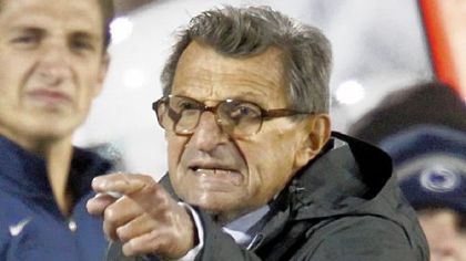 Penn State coach Joe Paterno disagrees with a side judge during a game against Michigan in October. Penn State won 41-31.