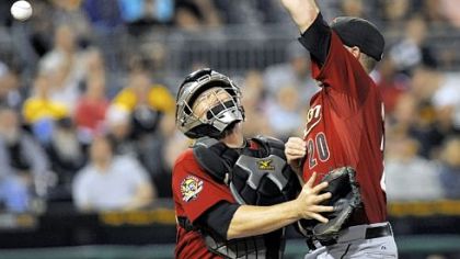 The ball caroms away as Houston catcher Humberto Quintero, left, and pitcher Bud Norris collide going for a popup in the second inning Saturday night at PNC Park in the Pirates' 6-4 victory.