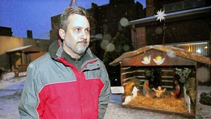 Anthony Lewandowski of Canonsburg reacts unfavorably to the creche being moved off borough property. He called a resident's complaint to borough Manager Terry Hazlett "stupid."