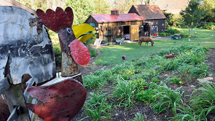 Metal objects provide decoration in Nada and Fred Sarkin's garden.