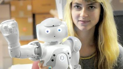 CMU doctoral student Heather Knight with her robot Little Toby.