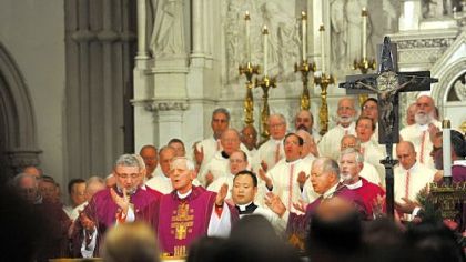 Cardinal Donald Wuerl, bottom center, celebrates Mass at St. Paul Cathedral.