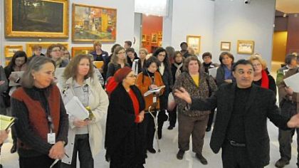 Amir Parsa, director of the Museum of Modern Art's Alzheimer's Project, takes volunteers who will lead tours here for persons with that disease or other dementias through the Scaife Gallery at the Carnegie Museum of Art.
