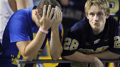 Pitt fans watch the final minutes of their team's loss to Miami at Heinz Field Thursday.