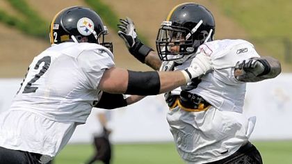 Steelers first-round pick Maurice Pouncey, right, goes through drills with teammate Justin Hartwig during the first day of the team's 2010 training camp in Latrobe last month.