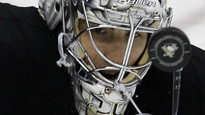 Penguins goalie Marc-Andre Fleury stops a shot in the first period of Friday's game at Consol Energy Center.