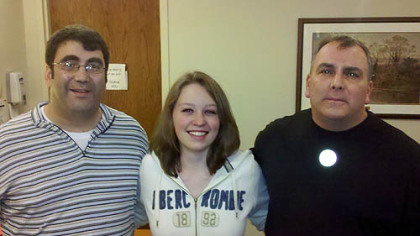 Alexandra Buchee, center, met the family of Jay Gebhardt, whom she performed CPR on when he had a heart attack Sunday. At left, Phil Gebhardt, Jay's brother, and Jeff Gebhardt Jay's brother.