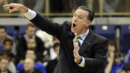 Pitt coach Jamie Dixon yells to his team in the first half of Wednesday's game against American at the Petersen Events Center. Dixon earned his 200th win.