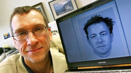 Charlie Frowd, a psychology professor at the University of Central Lancashire in England, has developed a new criminal composite sketch system called EvoFIT. An example of one of the computerized faces is on the monitor.
