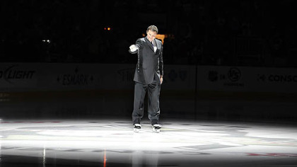 Penguins owner Mario Lemieux pours out water from the Mellon Arena onto the ice of the Consol Energy Center.