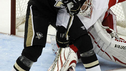 Penguins forward Evgeni Malkin can''t get a shot past Red Wings goaltender Chris Osgood in the first period.