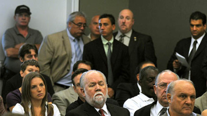 Allegheny County Labor Council President Jack Shea, center, said demolishing and redeveloping the Civic Arena site would create jobs.
