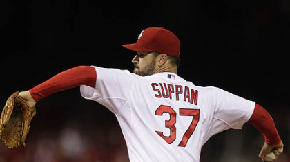 Cardinals starter Jeff Suppan pitches in the first inning.