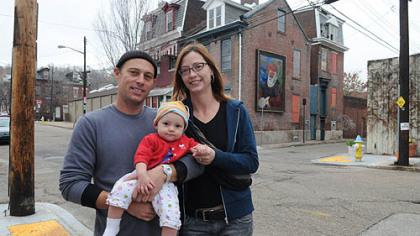John Fleenor, 44, his wife, Helen Perilloux, 41, and their 8-month-old daughter, Zephyrine Fleenor, are living on Gist Street,  Uptown, a neighborhood that Mr. Fleenor calls "a work in progress."
