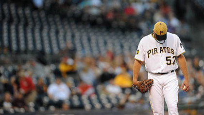 The Pirates' Zach Duke hangs his head just before being pulled Wednesday at PNC Park.