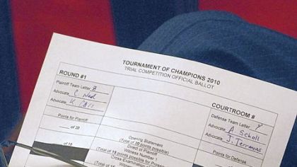 A member of the "jury" holds an official scoring ballot for the competition.