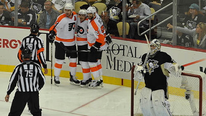 Flyers forwards Jeff Carter, right, Danny Briere, center, and Ville Leino celebrate after a second period goal against Penguins goaltender Marc-Andre Fleury during Thursday's game at Consol Energy Center.