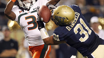 Pitt cornerback Dom DeCicco intercepts a pass in the end zone during the Miami game in September.