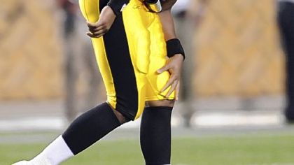 Steelers quarterback Byron Leftwich holds his left knee after getting injured against the Panthers in the second quarter. Leftwich left the game with the injury.