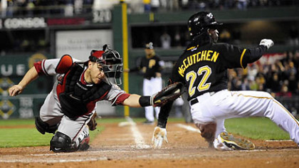 Diamondbacks catcher Miguel Montero misses the tag as the Pirates' Andrew McCutchen scores game-winning run on an RBI single by Ronny Cedeno in the bottom of the ninth during Friday's game at PNC Park.