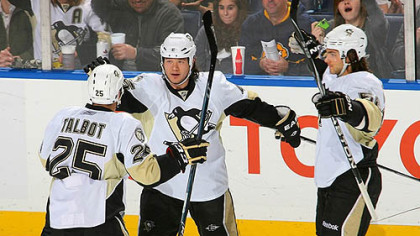 Penguins forwards Maxime Talbot, Arron Asham and defenseman Kris Letang celebrated a first period against the Sabres at HSBC Arena in Buffalo Saturday.