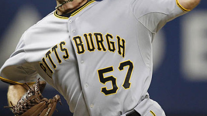 Pirates starting pitcher Zach Duke delivers in the first inning.