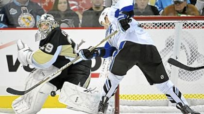 Marc-Andre Fleury makes a save against the Lightning's Adam Hall in the third period Friday.