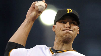 Pirates starting pitcher Charlie Morton throws in the first inning.