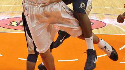 Pitt's Dante Taylor dunks the ball on Maryland's Jordan Williams in the second half.