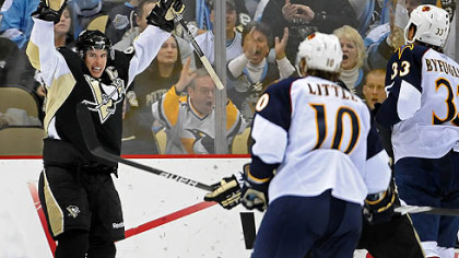 Penguins captain Sidney Crosby celebrates his third goal in second period of Wednesday's game against the Thrashers at the Consol Energy Center.