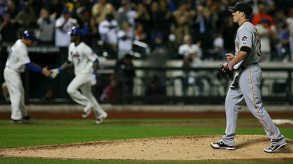 Pirates pitcher Daniel McCutchen walks back to the mound after allowing a home run from the Mets' Jose Reyes in the sixth inning of Wednesday's game at Citi Field in New York.