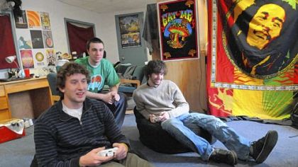 Living together this term in a study lounge at the University of Pittsburgh's Litchfield Towers are, from left, freshmen Pete Rowan of Reading, and Matt Cassidy and Tom Boudwin, both of West Chester.