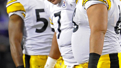 Steelers quarterback Ben  Roethlisberger is helped off the field after his nose was broken from a punch by the Ravens' Haloti Ngata in Sunday night's game. Ngata was fined $15,000 for the play.