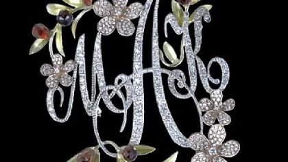 Lou Guarino of Louis Anthony Jewelers presented this 18-karat white gold and diamond brooch to former Secretary of State Madeleine Albright.