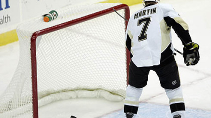 Penguins defenseman Paul Martin scores an empty-net goal during the the third period.