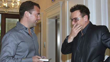 Russian President Dmitry Medvedev, left, and U2's Bono hang out.