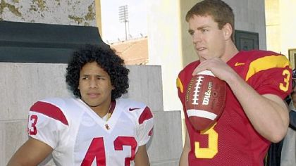 Polamalu's hair was shorter in college at Southern California, where he was teammate and roommate to Carson Palmer, now quarterback for the Cincinnati Bengals.