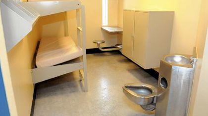 A typical cell in the new building at the prison has two bunk beds, a toilet, a small table and cable hook-up for inmates who buy a television.