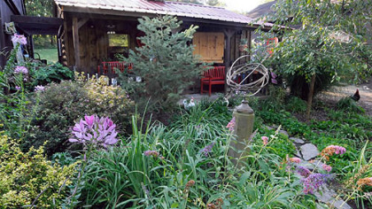 The playhouse in Nada and Fred Sarkin's garden at their rural Penn Twp., Butler County home.