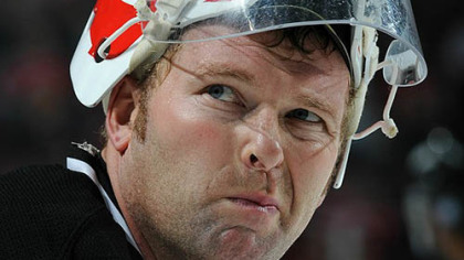 Devils goaltender Martin Brodeur lays on the ice after making a glove save during the third period.