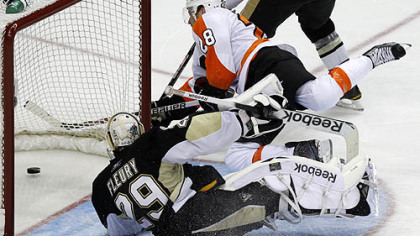 Flyers forward Claude Giroux gets a third period goal by Penguins goaltender Marc-Andre Fleury in the third period.