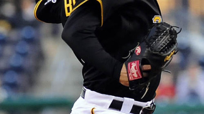 Pirate pitcher Brian Burres throws during the first inning.
