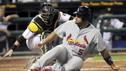 Cardinals Albert Pujois after hiting a 3-run homer in the first inning.