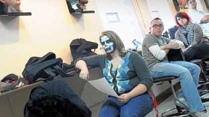 Anastasia Howarth, 18, of Monaca, listens to her instructor in anatomy class Thursday after taking a special makeup class at Tom Savini's Special Make-up Effects Program, part of the Douglas Education Center in Monessen.